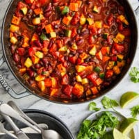 Homemade vegetarian chili, loaded with sweet potato, zucchini, and beans.