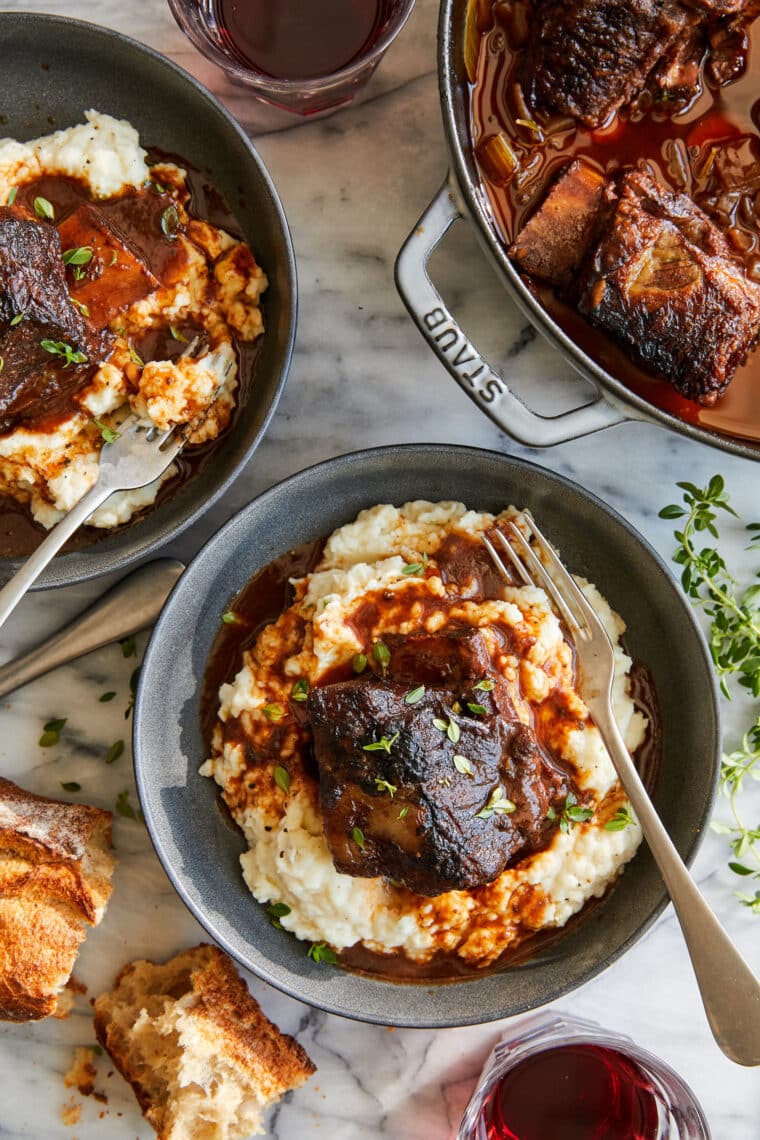 Braised Short Ribs - Best ever red wine braised short ribs. So tender, so fall-off-the-bone amazing. Serve over mashed potatoes - SO SO GOOD.