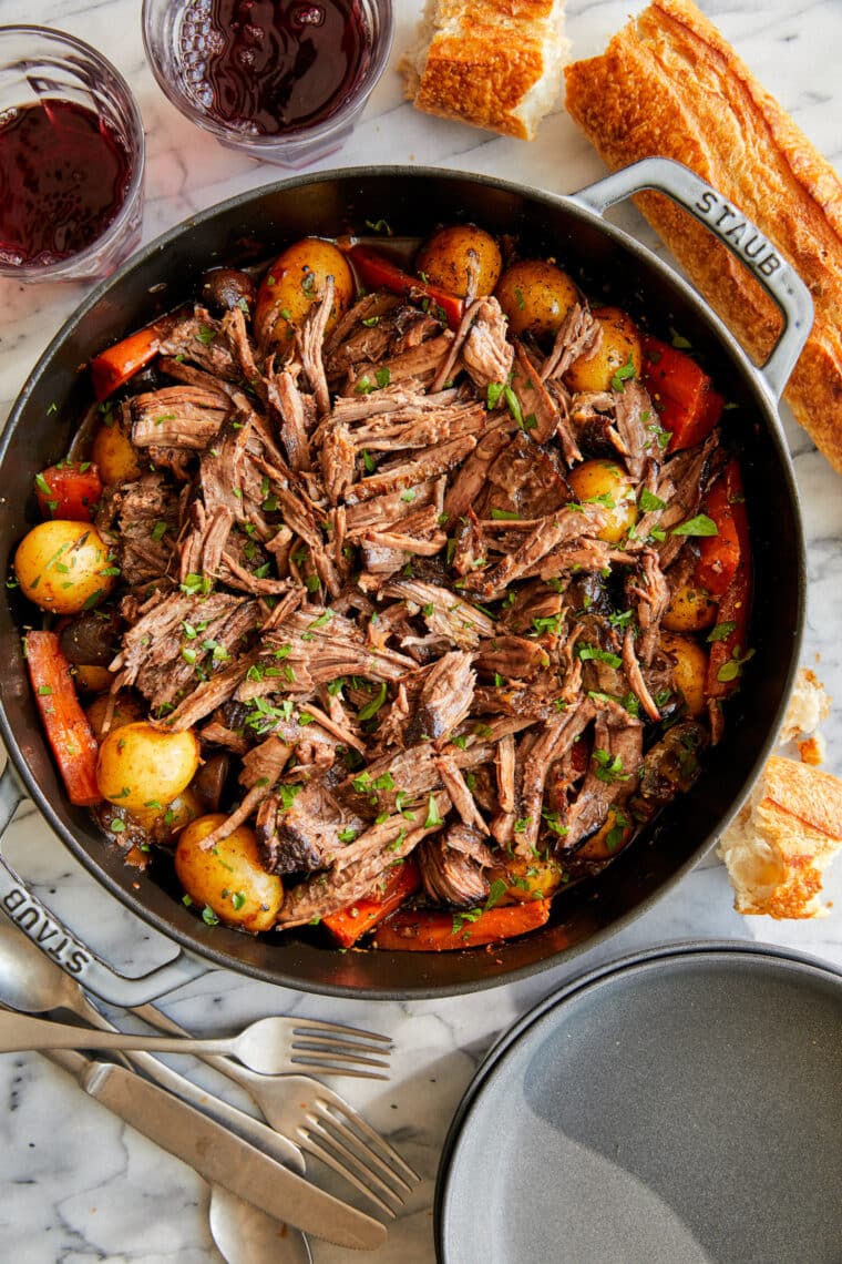 Perfect Pot Roast - Truly the best melt-in-your-mouth pot roast, cooked low and slow and simmered until perfection. Serve with crusty bread!