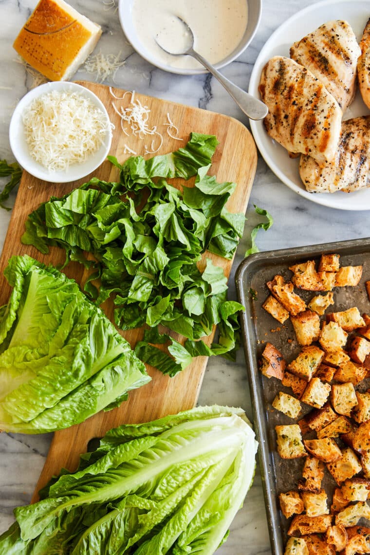 Best Chicken Caesar Salad with Homemade Croutons - Truly THE BEST ever. With crispy, seasoned croutons, grilled chicken and an easy dressing!