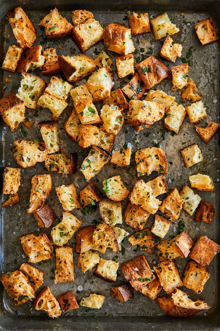 Best Chicken Caesar Salad with Homemade Croutons - Truly THE BEST ever. With crispy, seasoned croutons, grilled chicken and an easy dressing!