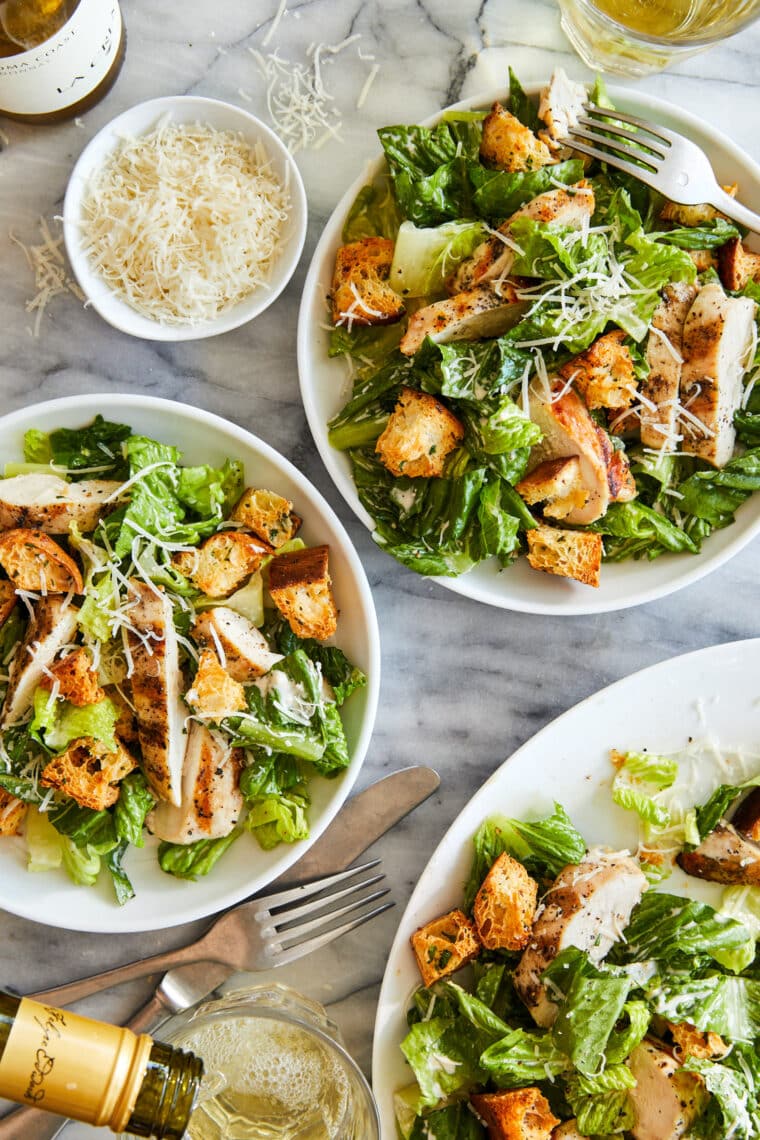 Best Chicken Caesar Salad with Homemade Croutons - Truly THE BEST ever. With crispy, seasoned croutons, grilled chicken and an easy dressing!