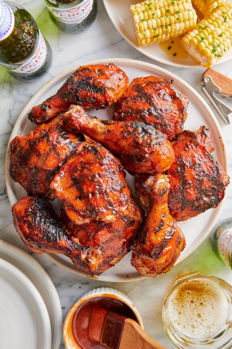 Grilled BBQ Chicken - Tender, juicy chicken grilled to perfection with a sweet and sticky barbecue glaze! Includes the easiest marinade ever.