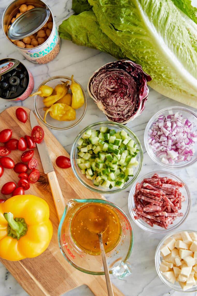 Italian Chopped Salad - Crisp lettuce, cubed mozzarella, and diced salami in a red wine vinaigrette. So colorful, so vibrant, and so so good!