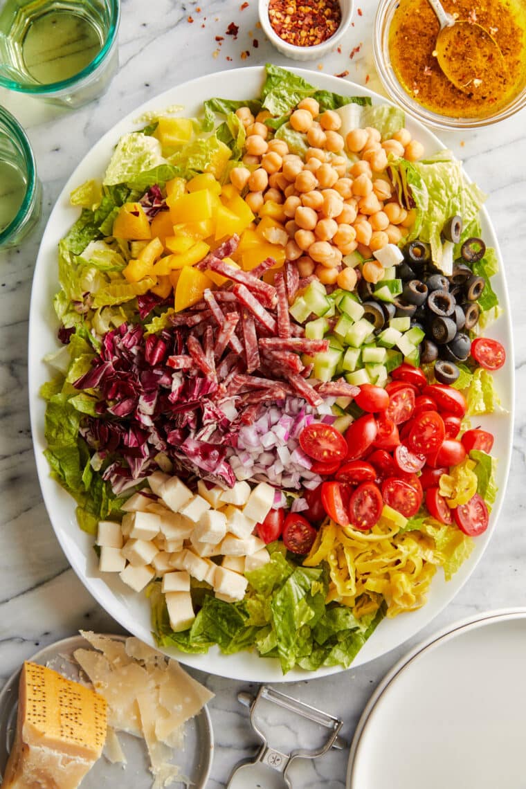 Italian Chopped Salad - Crisp lettuce, cubed mozzarella, and diced salami in a red wine vinaigrette. So colorful, so vibrant, and so so good!