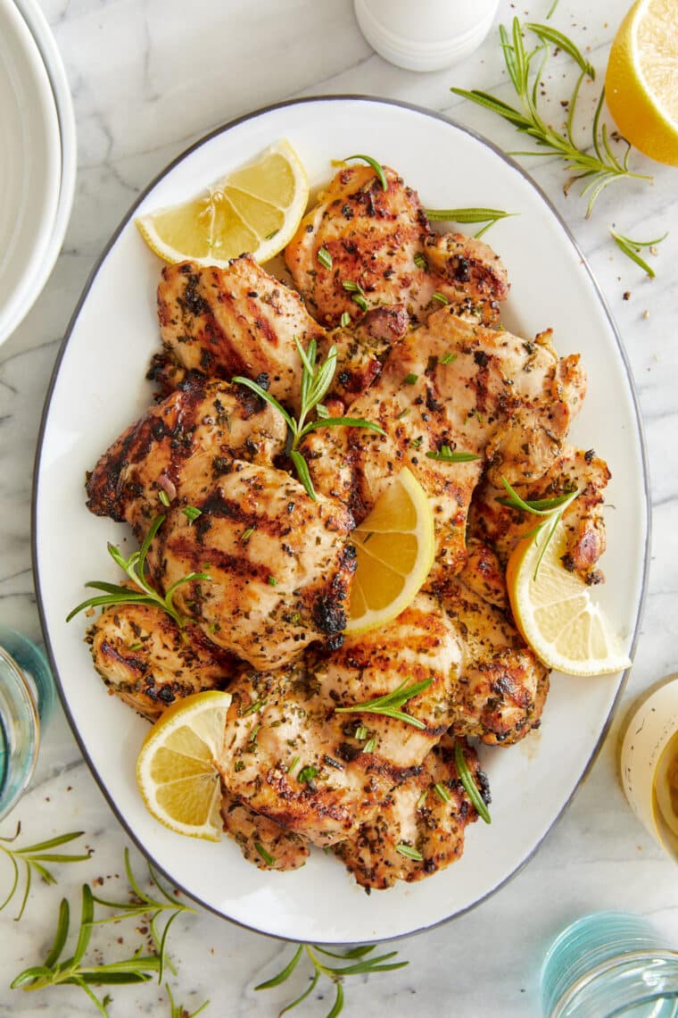 Tuscan Lemon Chicken - Marinated in olive oil, lemon, rosemary, thyme, garlicky goodness. So juicy, tender and moist, grilled to perfection!