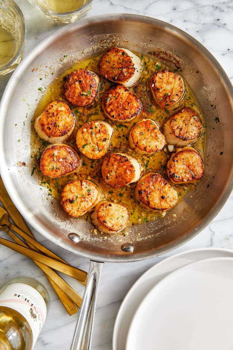 Lemon Butter Scallops - All you need is 5 ingredients + 10 minutes for the most amazing, buttery scallops ever. So easy, so simple, so fancy!