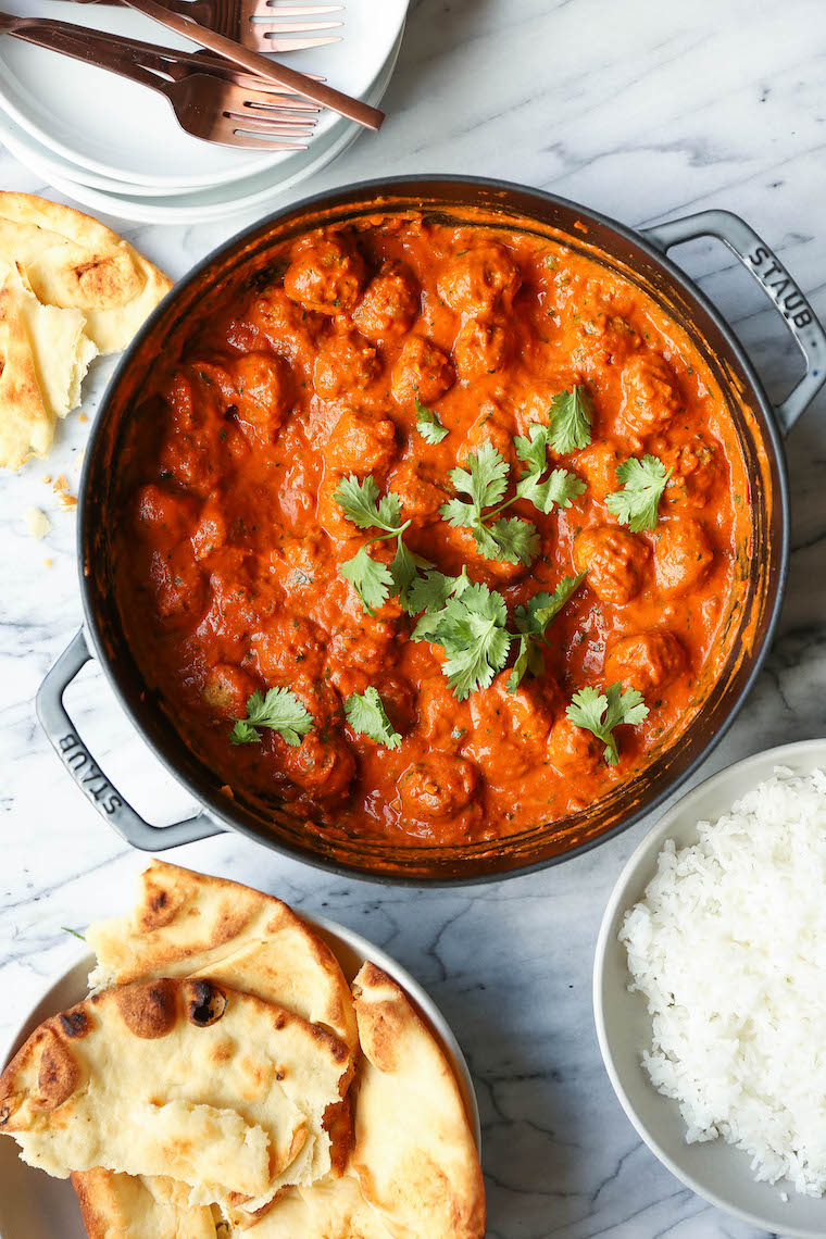 Butter Chicken Meatballs - Everyone's favorite butter chicken made into the most tender, most amazing meatballs! So saucy, so good. Serve with rice + naan!