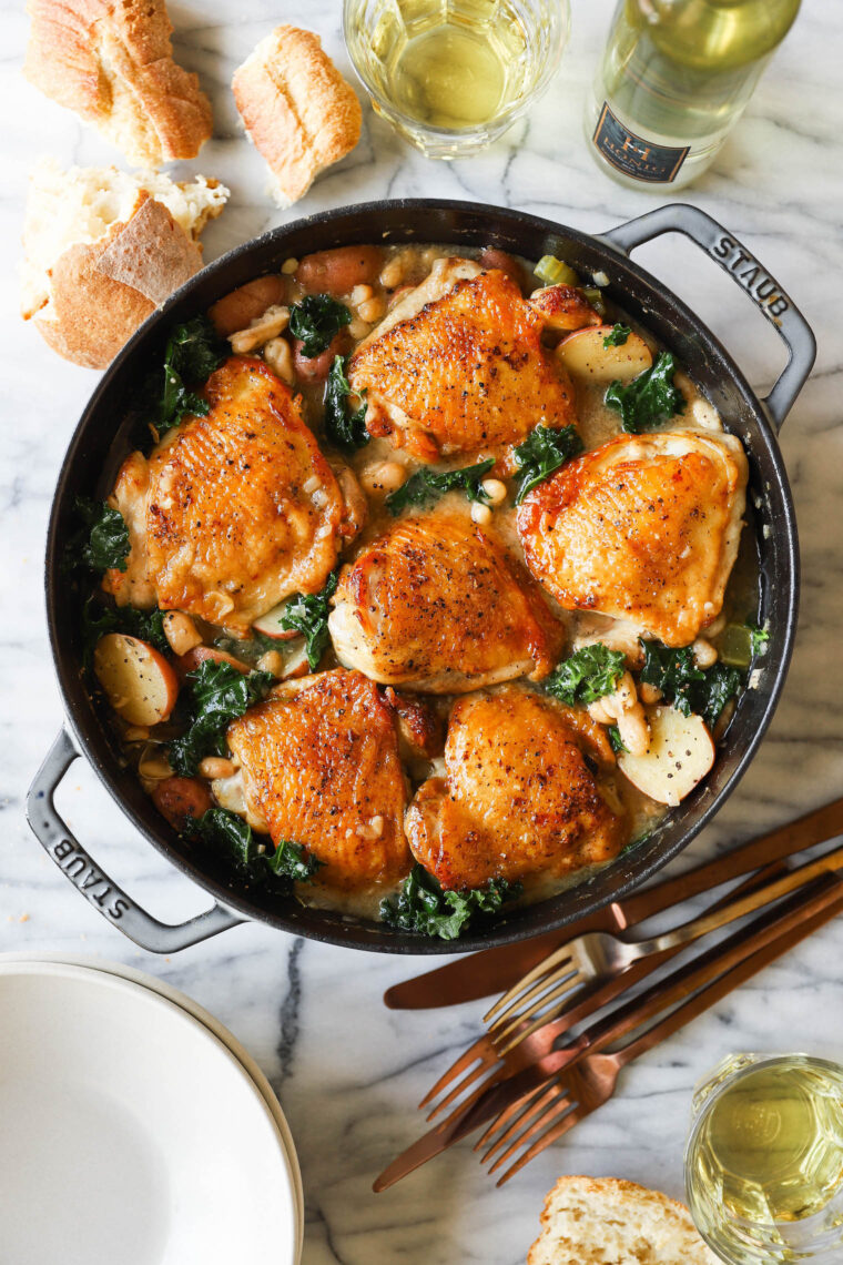 Chicken and White Bean Stew - Chockfull of chicken, white beans, potatoes and kale! Serve with a salad and crusty bread. SO GOOD, so cozy.