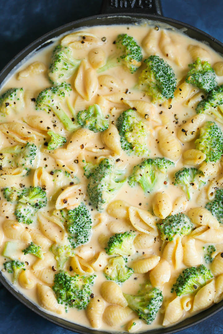 Creamy Broccoli Mac and Cheese - The EASIEST and CREAMIEST mac and cheese made in less than 30 min! Comfort food perfection! And it is the perfect way to sneak in those greens!