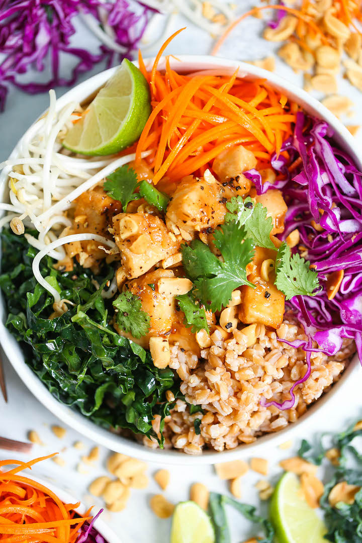 Thai Chicken Buddha Bowls - Healthy, hearty and nutritious bowls filled with whole grains, plenty of veggies, and a simple peanut sauce that is absolutely to die for!