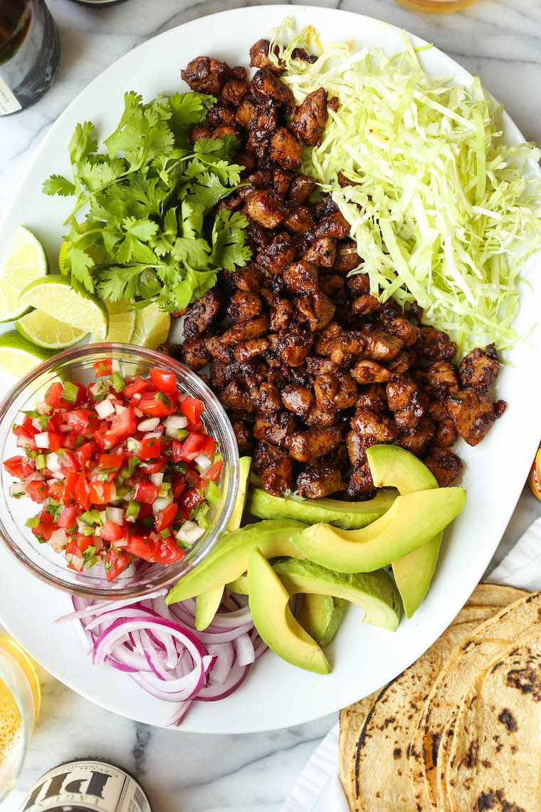 Easy Pork Carnitas - Juicy, tender pork carnitas made in 30 min, start to finish! No fuss, no hassle. Serve as tacos or burrito bowls. So easy, so so good.