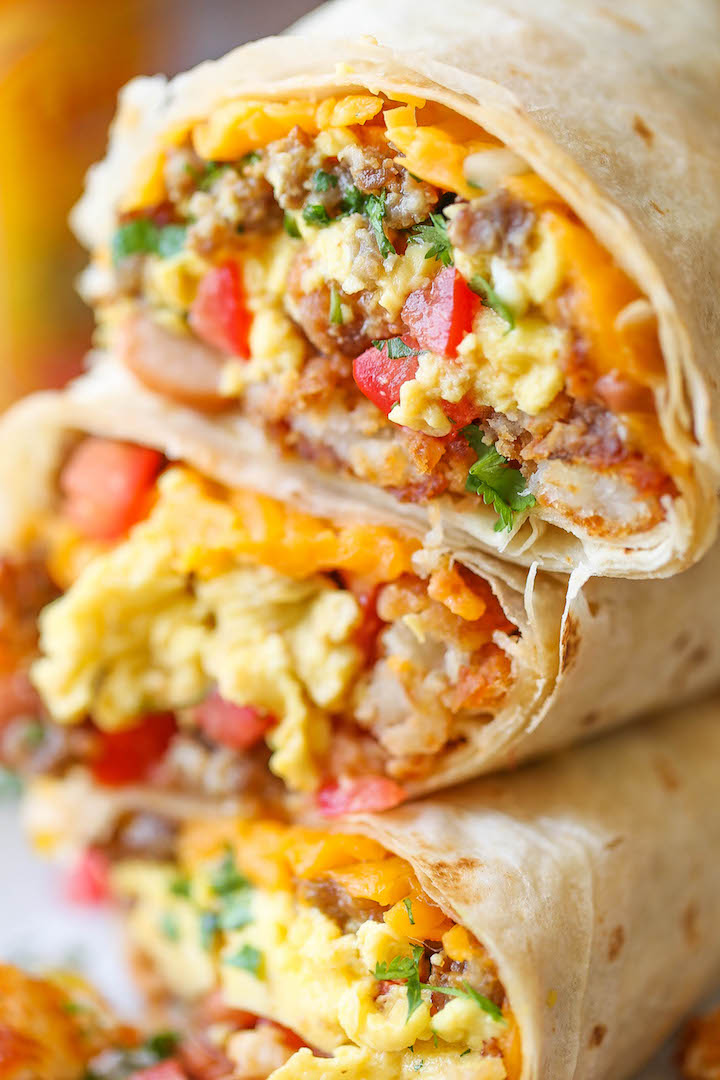 Freezer Breakfast Burritos - Meal prep over the weekend for the best burritos during the week. Loaded with tater tots, eggs, beans and cheese, of course!!