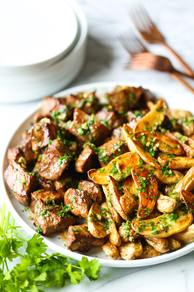 Garlic Butter Steak Bites and Fries - Perfectly garlicky and oh-so-buttery! These steak bites just melt in your mouth, paired with crisp-baked fries!