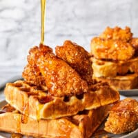Super crispy fried chicken, drizzled with a warm honey glaze, served with buttermilk waffles.