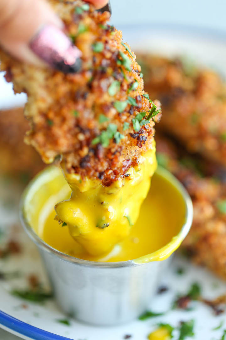 Honey Mustard Chicken Fingers - Heart-healthy chicken tenders completely baked in an AMAZING mustard sauce and coated with a nutty crunchy pecan crust!