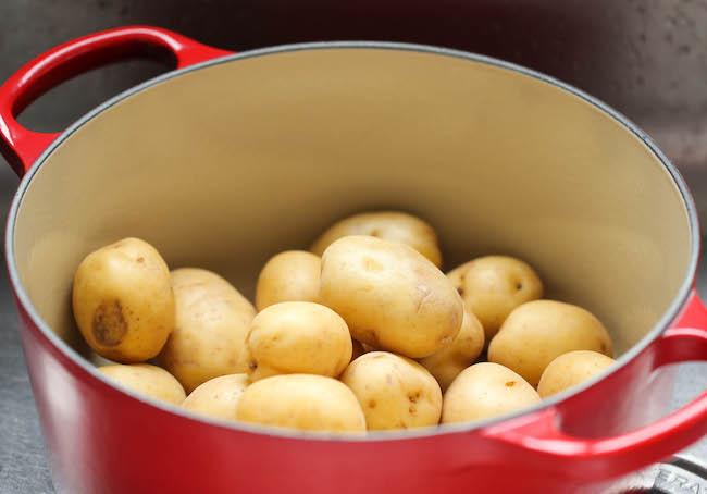 Garlic Smashed Potatoes - These potatoes are incredibly tender on the inside yet amazingly crisp on the outside!