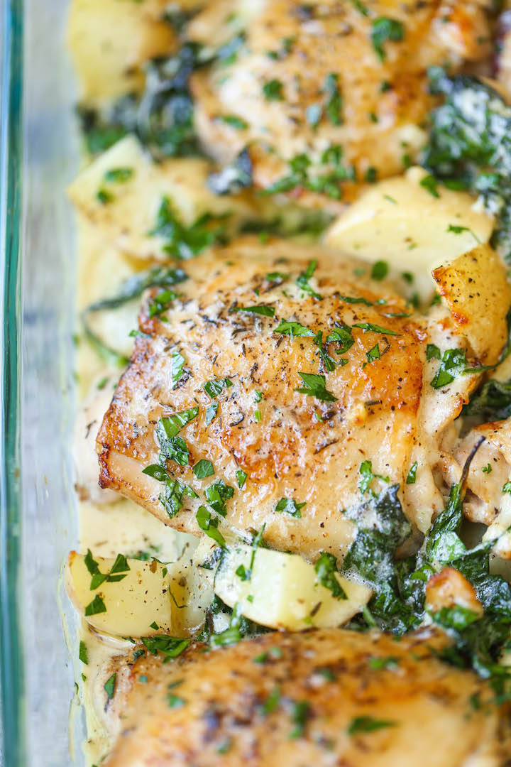 Chicken and Potatoes with Garlic Parmesan Cream Sauce - Crisp-tender chicken baked to absolute perfection with potatoes and spinach. A complete meal in one!