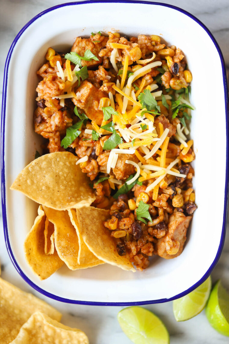 Instant Pot 20 Minute Chicken Burrito Bowls - This literally comes together in less than 10 min prep and another 10 min in the pressure cooker. The chicken is so tender and the flavors are just unbelievable here! After this, you'll never want to make burrito bowls without your Instant Pot!