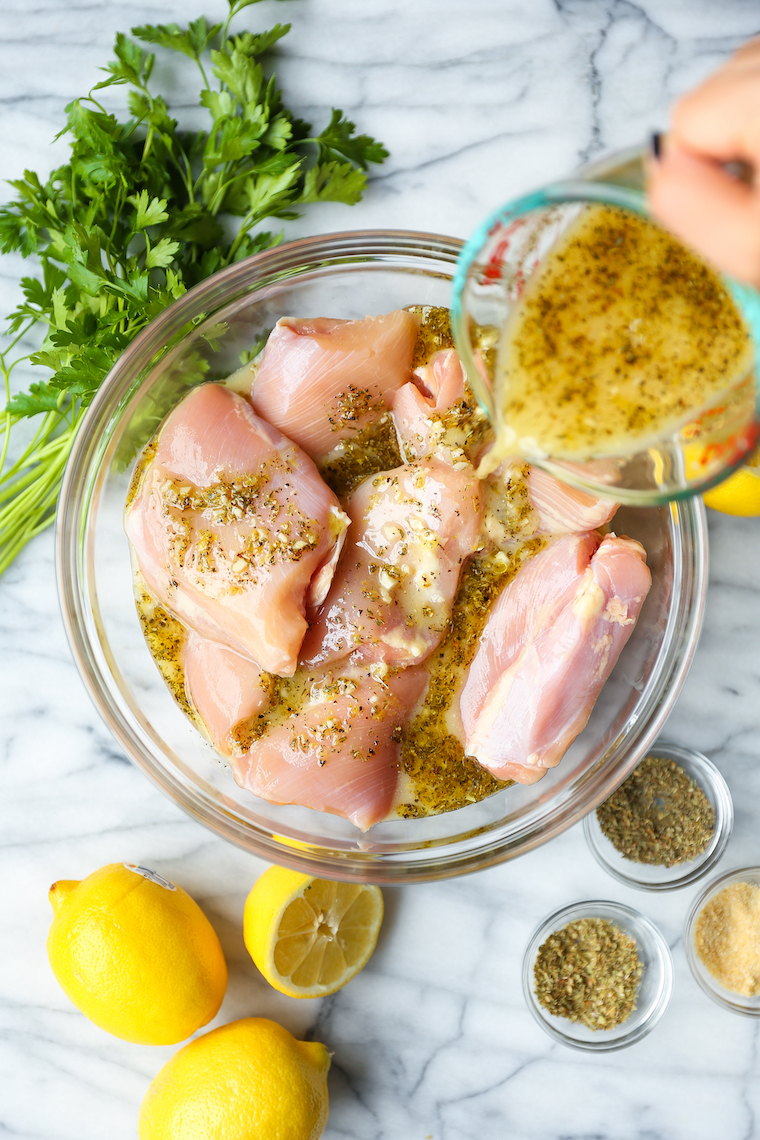 Lemon Garlic Chicken Thighs - Olive oil, lemon juice/zest, garlic, Dijon, oregano, thyme. THE BEST marinade ever. Made on the grill or stovetop. SO SO GOOD.