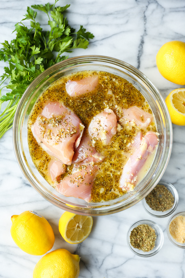 Lemon Garlic Chicken Thighs - Olive oil, lemon juice/zest, garlic, Dijon, oregano, thyme. THE BEST marinade ever. Made on the grill or stovetop. SO SO GOOD.