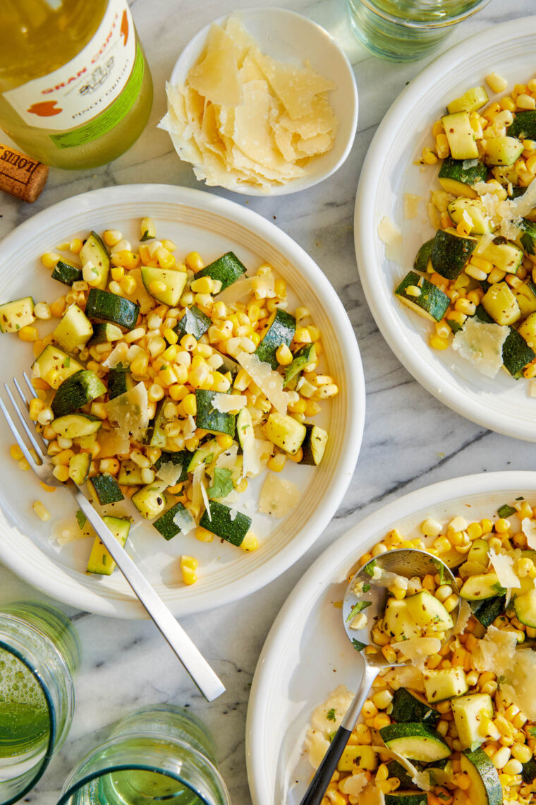 Parmesan Zucchini and Corn - A healthy 10 minute zucchini side dish to dress up any meal. It's so simple yet full of flavor! SO SO GOOD.