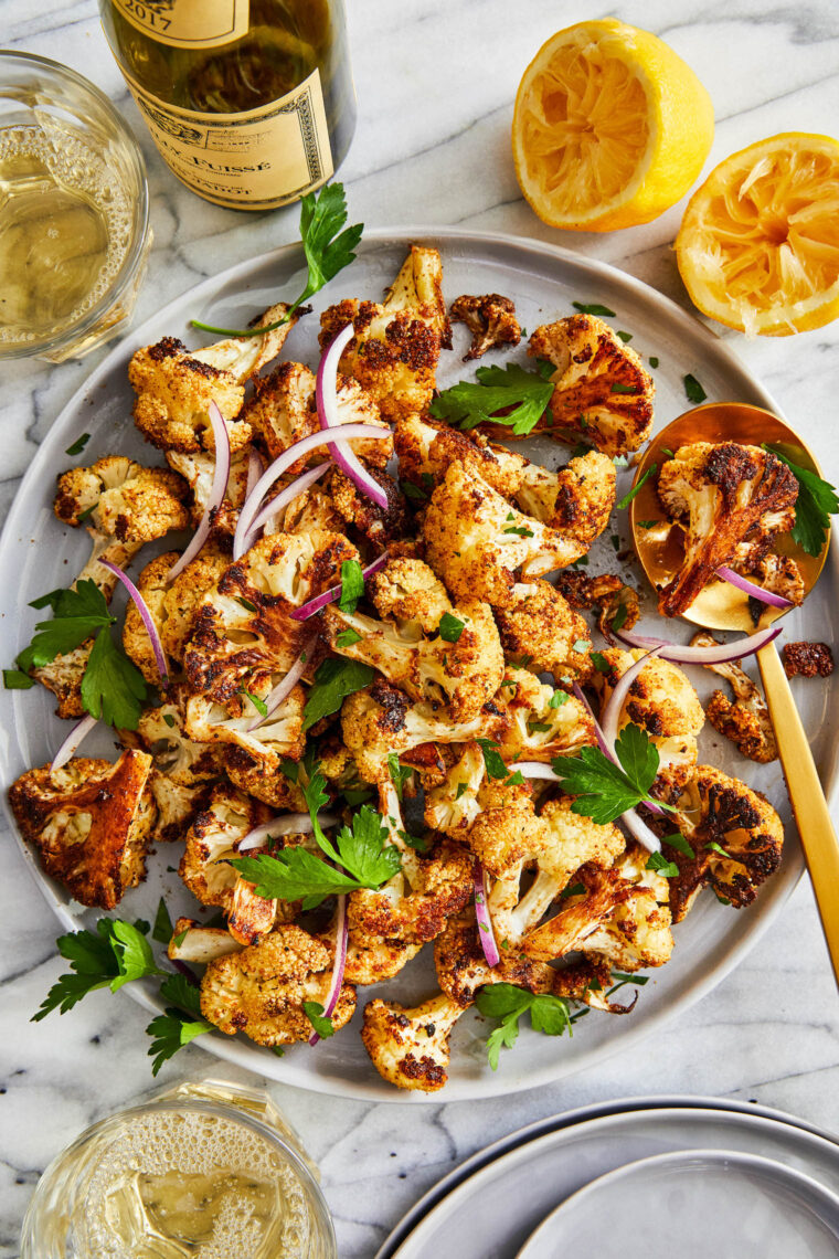 Roasted Cauliflower - The BEST seasoned roasted cauliflower! Amazingly crisp-tender, golden-brown and the most perfect side dish to any meal!