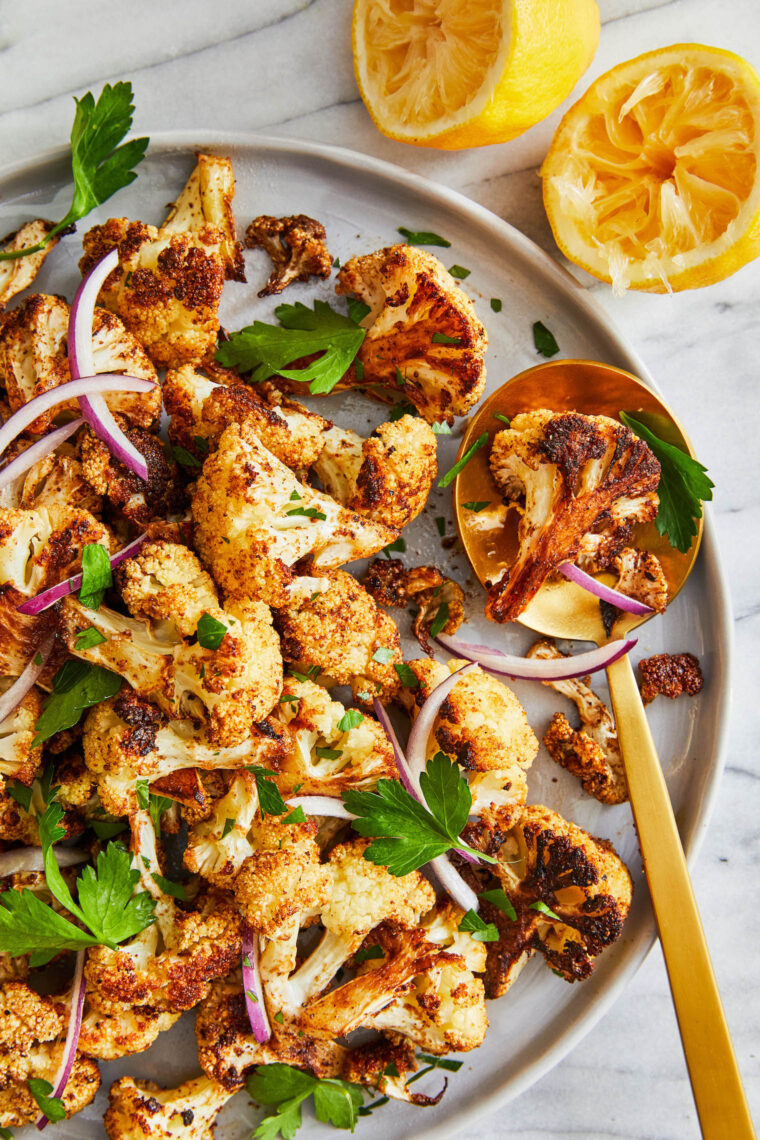 Roasted Cauliflower - The BEST seasoned roasted cauliflower! Amazingly crisp-tender, golden-brown and the most perfect side dish to any meal!