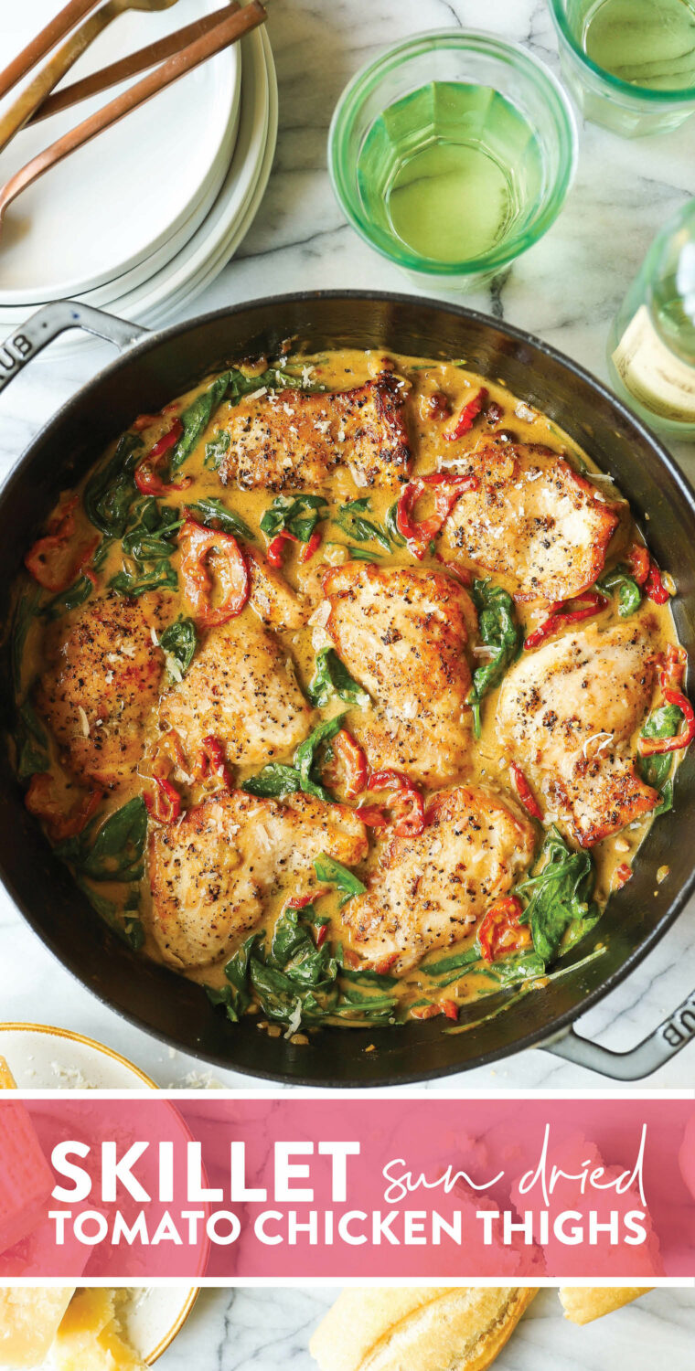 Skillet Sun Dried Tomato Chicken Thighs - Juicy, golden brown chicken in the sauciest, sun dried tomato cream sauce with sneaked-in greens!