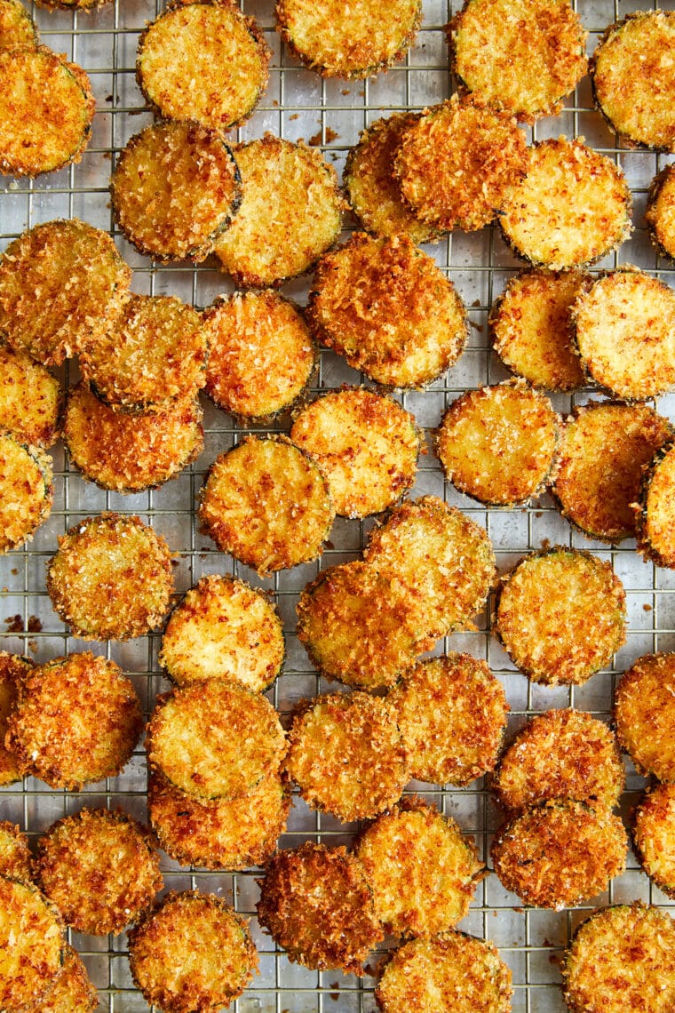 Zucchini Parmesan Crisps - Perfectly golden brown parmesan-crusted zucchini slices (to use up all that summer zucchini!). So crispy, so good!