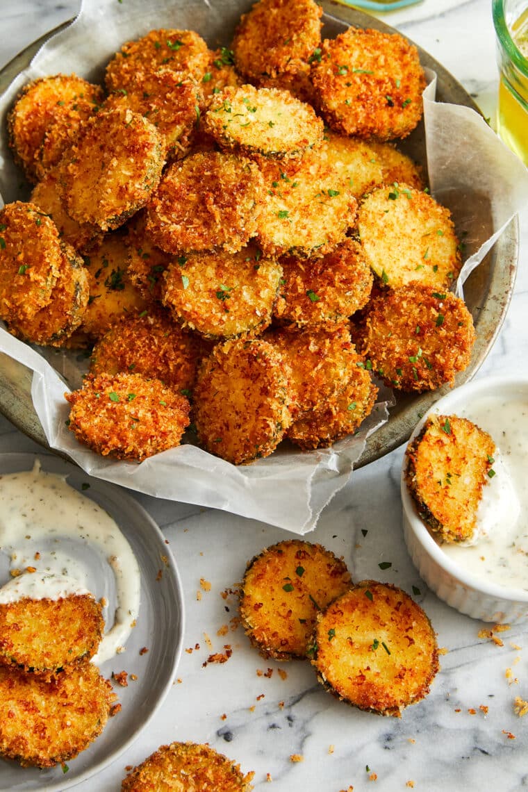 Zucchini Parmesan Crisps - Perfectly golden brown parmesan-crusted zucchini slices (to use up all that summer zucchini!). So crispy, so good!