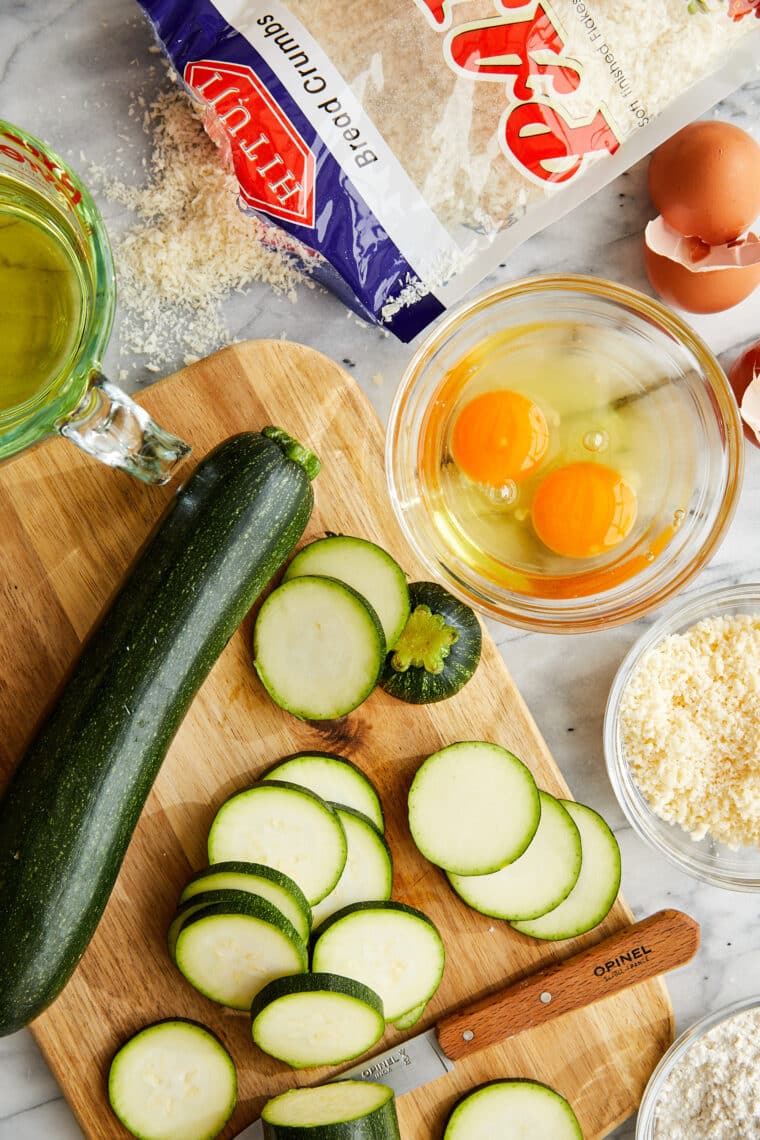 Zucchini Parmesan Crisps - Perfectly golden brown parmesan-crusted zucchini slices (to use up all that summer zucchini!). So crispy, so good!